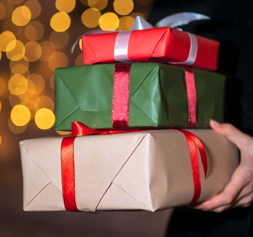 Drei eingepackte Geschenke, Stockbild