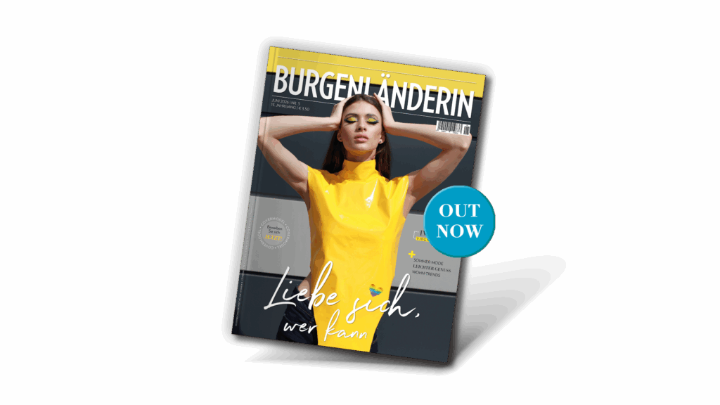 Magazincover der BURGENLÄNDERIN: Frau in glänzend gelbem Oberteil mit geschlossenen Augen und auffälligem gelb-blauem Augen-Make-up vor dunklem Hintergrund, Titelthema „Liebe dich, wer kann“.