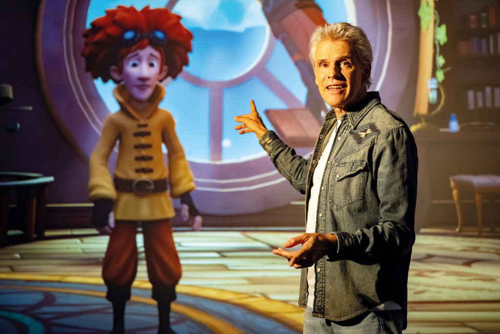Animation / Familienunterhaltung: Event-Tipps im Burgenland: Ein Mann präsentiert einen Animationsfilm mit einem rothaarigen Jungen als Hauptfigur.
